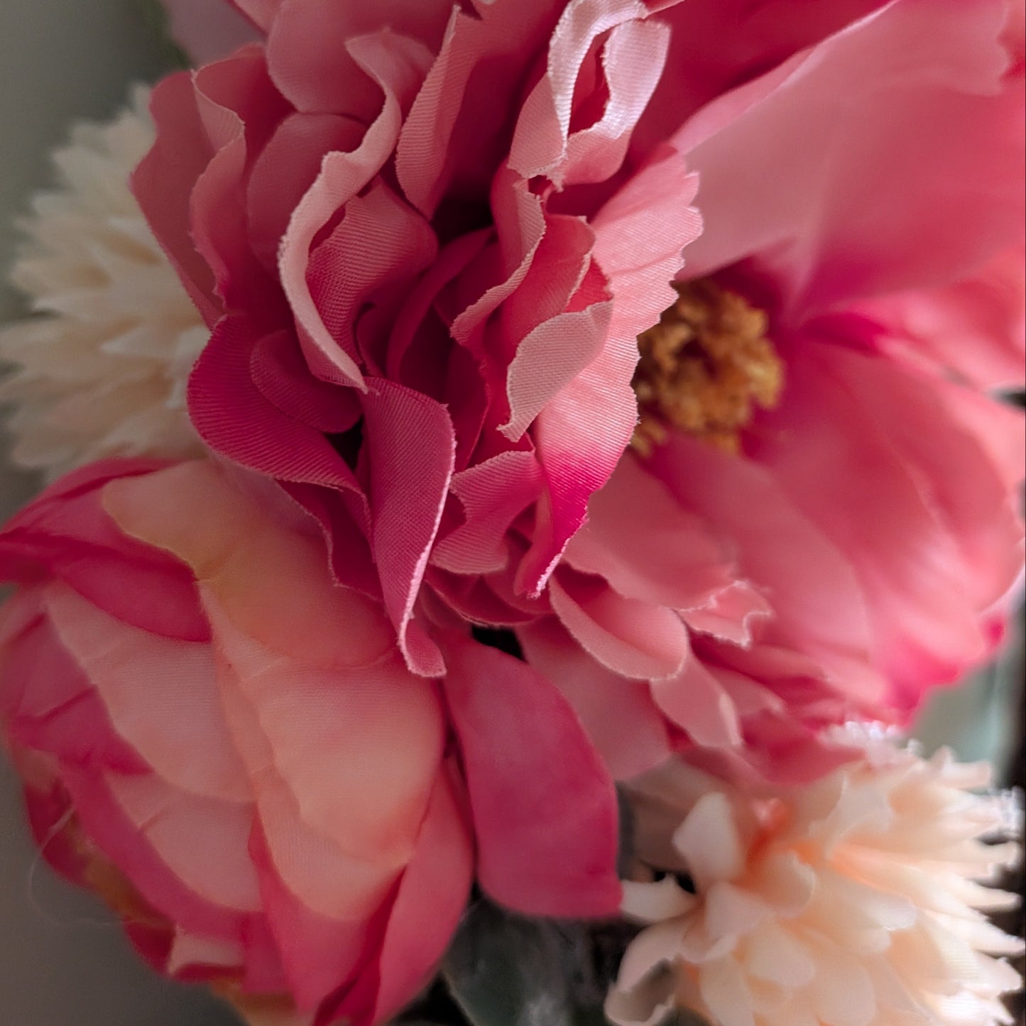 A close up of the faux pink/vanilla florals on the Rhubarb & Custard wreath