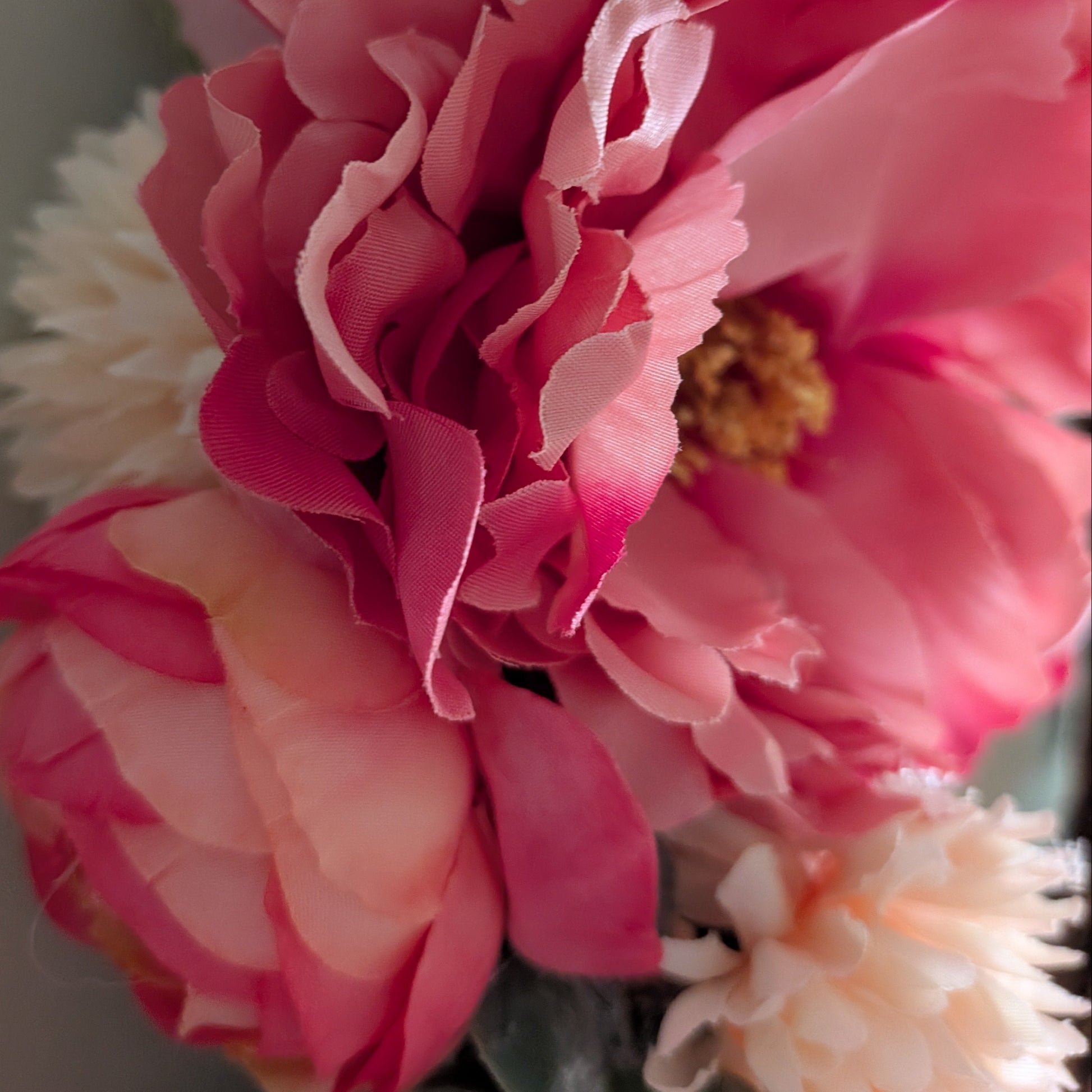 A close up of the faux pink/vanilla florals on the Rhubarb & Custard wreath