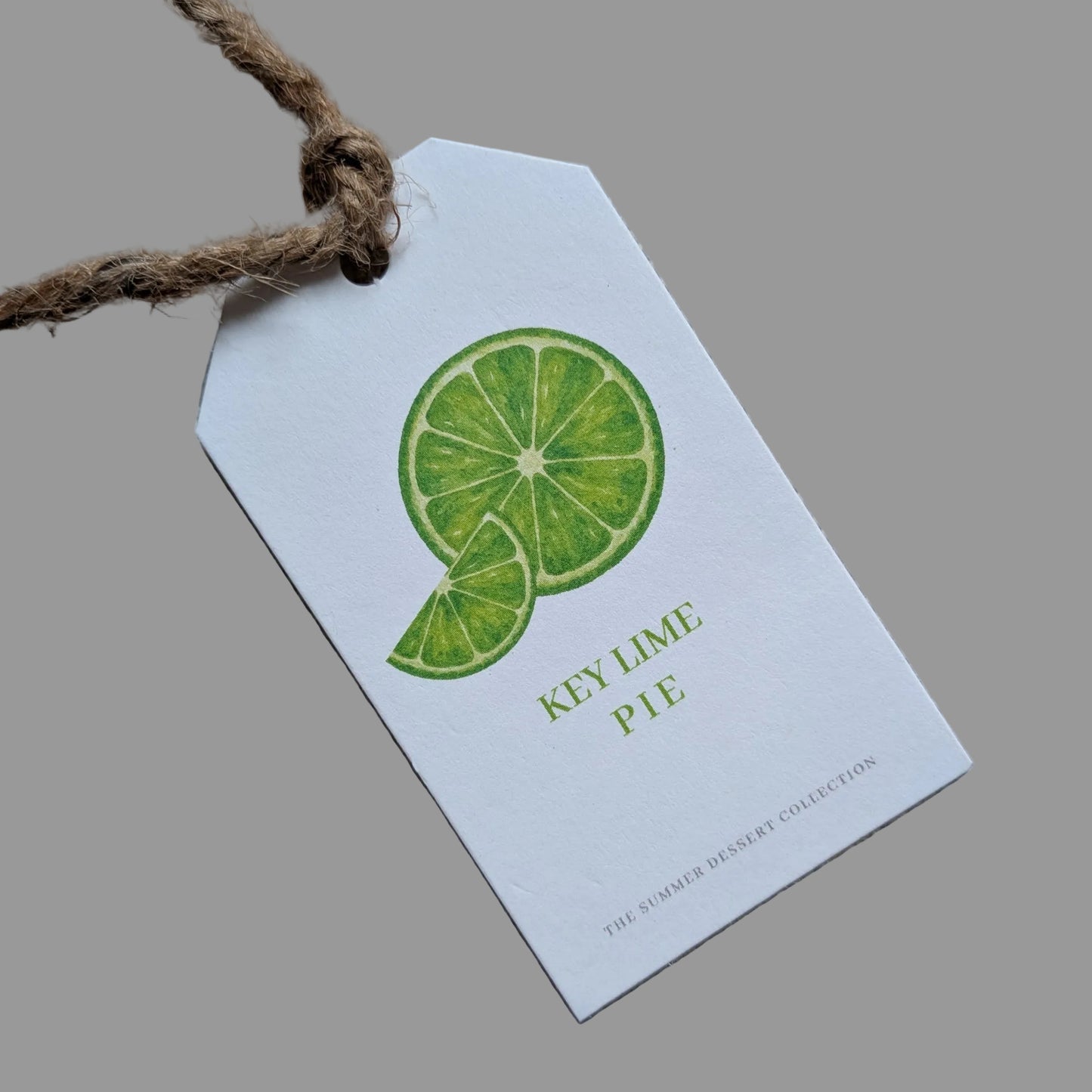 close up of front Key Lime Pie wreath tag with a natural jute twine