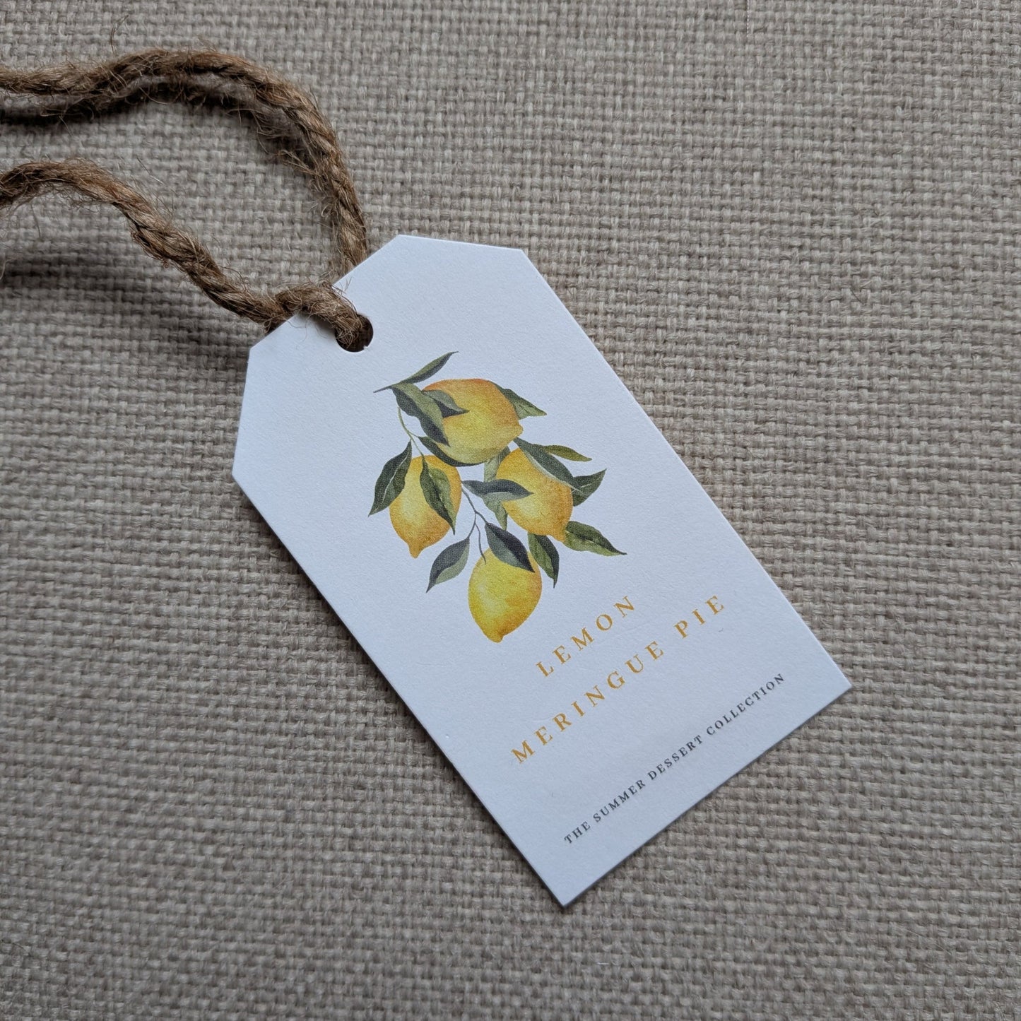 Close up of the front of the Lemon Meringue Pie tag with natural jute twine